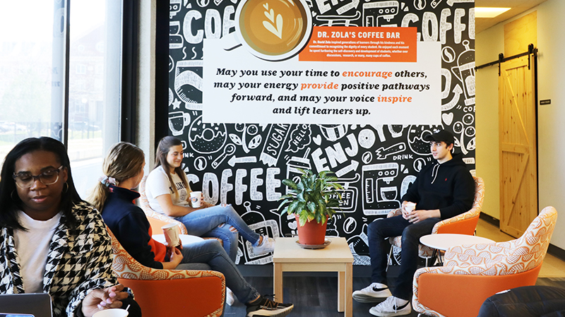 Students working and talking in the Dr. Zola Coffee Bar