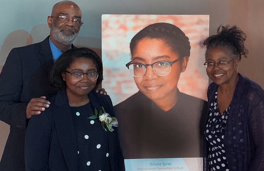 Briana Lucas, her father, and mother