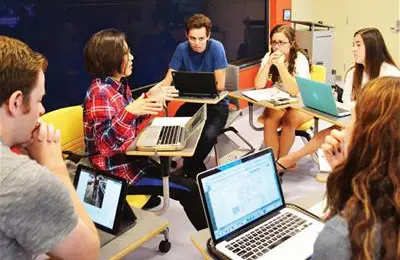 Woman talking to a class
