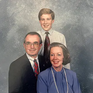 Meginnis family photo from the 1990s: Colin at the top, Paul at left and Kay, right