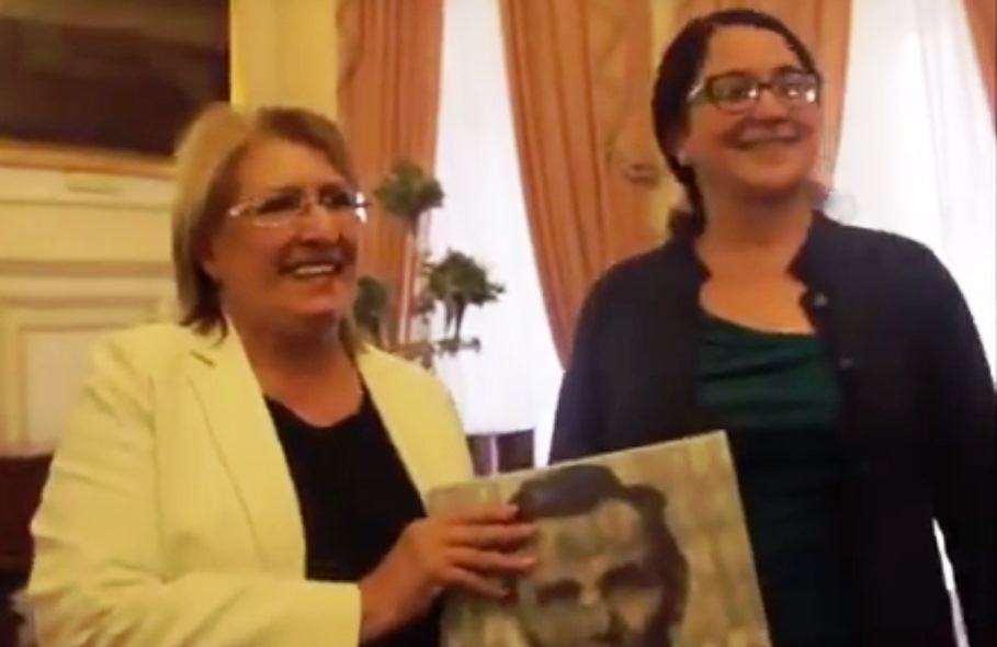 Malta President Marie Louise Coleiro Preca receives a gift from Professor Linda Herrera