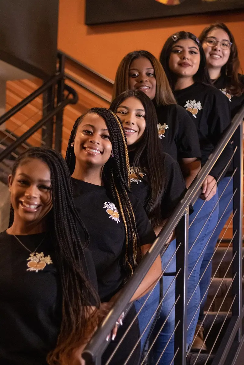 SEEDS members smiling at the camera