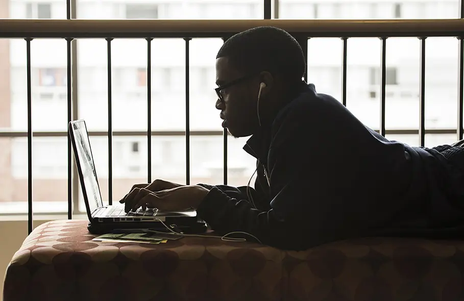 student on laptop computer in Illini Union